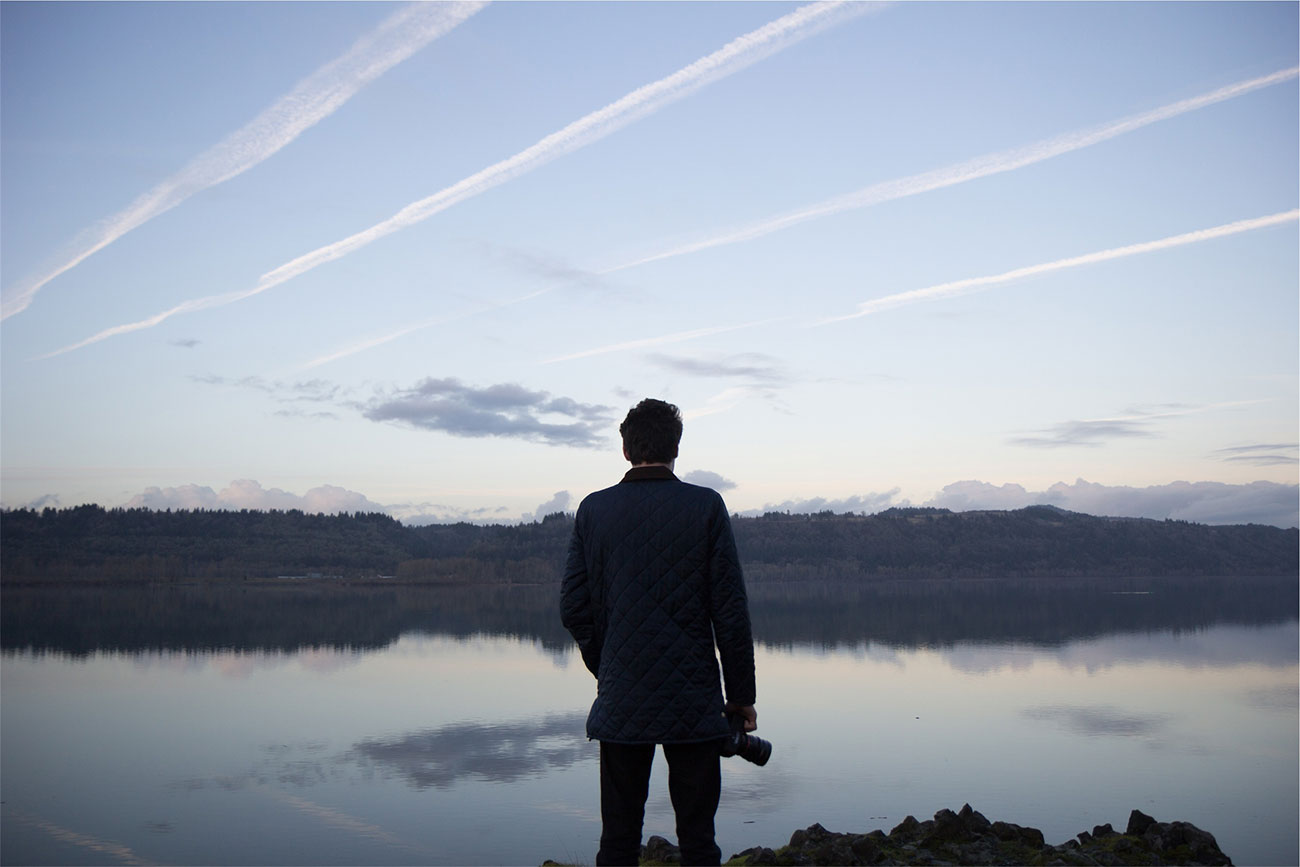 Man in front of a lake